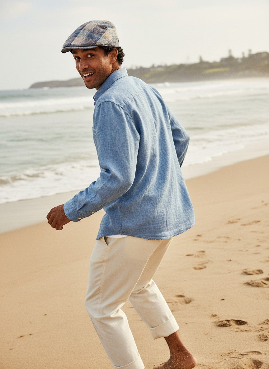 Sbarià blue and beige plaid linen and cotton flat cap with a short brim and vertical blue linen panels.