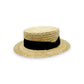 Sbarià natural straw boater hat with black ribbon and metal logo pin. Flat brim, square crown.
