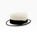 Sbarià natural straw bowler hat with black cotton band and brim trim. Classic dome crown.
