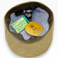 Sbarià olive green bamboo fabric Coppola Duffy cap with a light blue patterned lining.