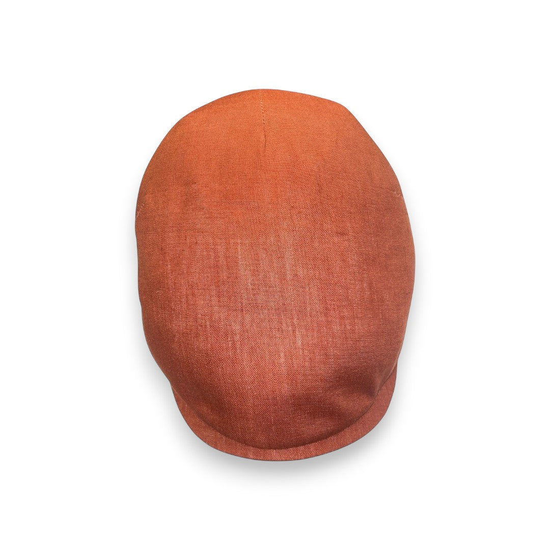 Sbarià orange pure linen flat cap, ideal for sunny days and casual or sophisticated looks.