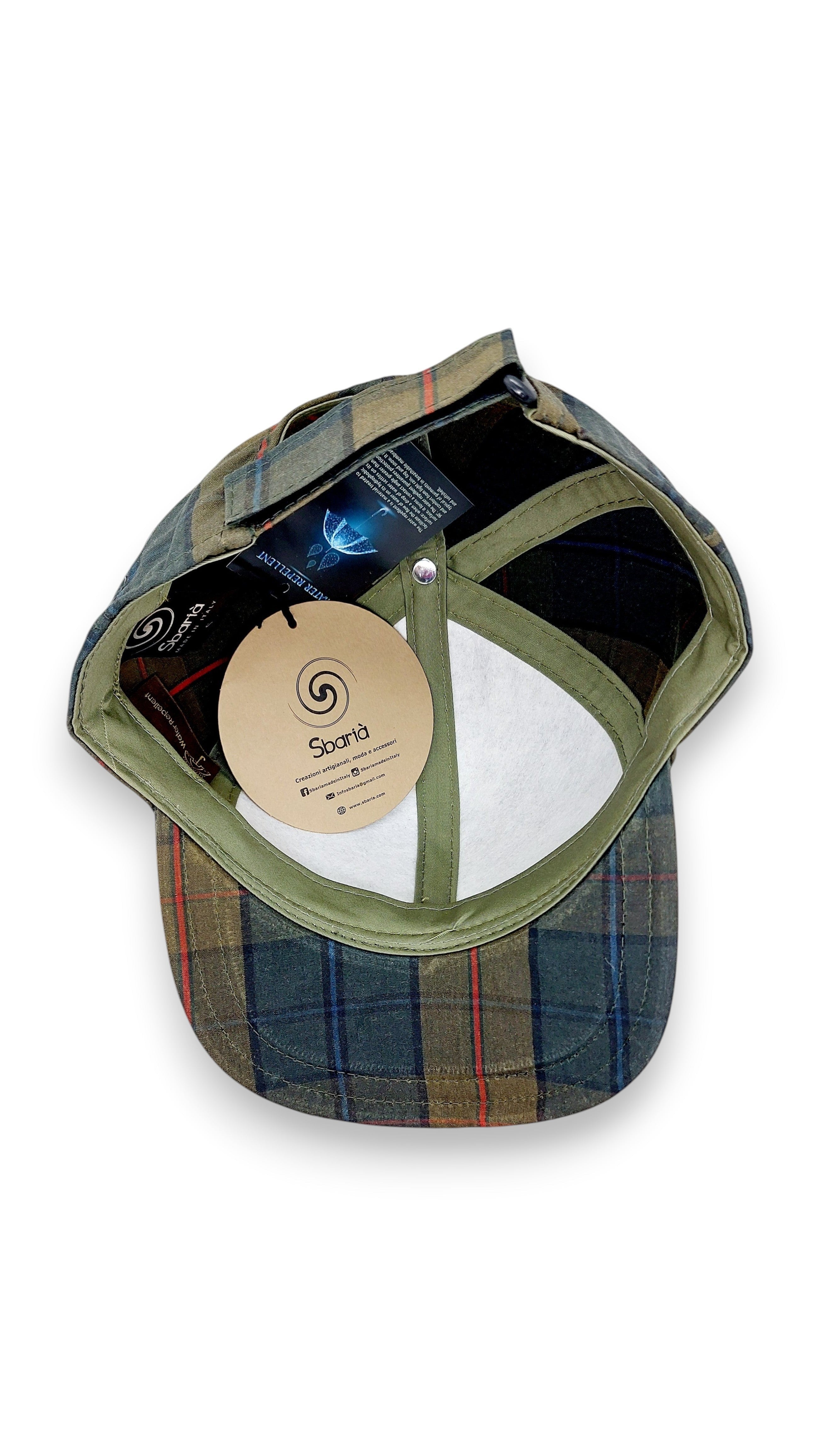 Sbarià British tartan baseball cap in water-repellent waxed cotton with adjustable strap and structured brim.