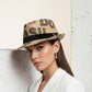 Sbarià unique coffee sack jute trilby hat with black band and text detail. Short brim fedora style.