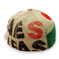 Sbarià baseball cap made from recycled coffee jute with natural beige linen details. Features vintage style, adjustable strap, and UV protection.