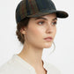 Sbarià British tartan baseball cap in water-repellent waxed cotton. Features a rigid visor and adjustable strap for a comfortable fit.